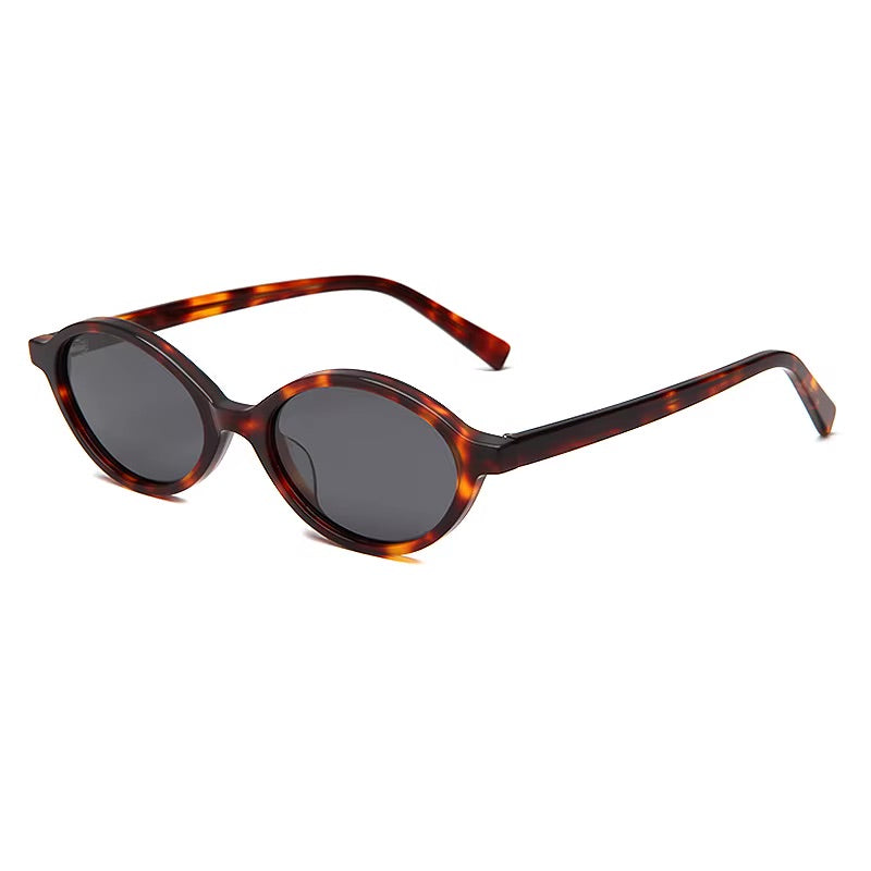 Sorano HELIOS sunglasses with sleek black frames and tinted lenses, stylish eyewear for sun protection and fashion.
